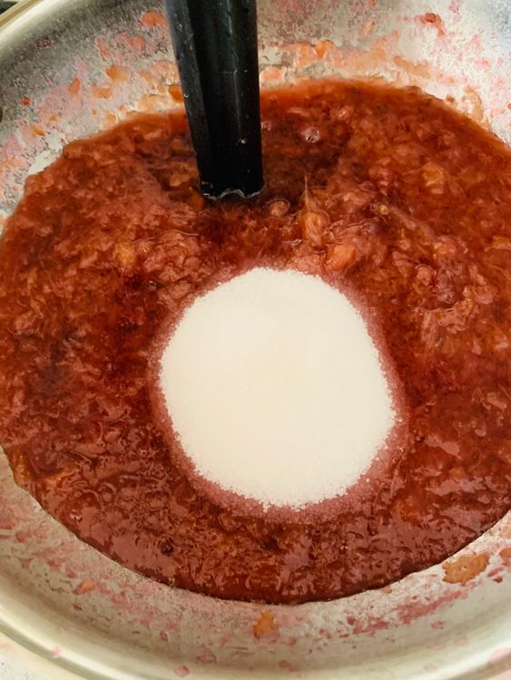 Step 2.1: Return the mashed plums to the stove