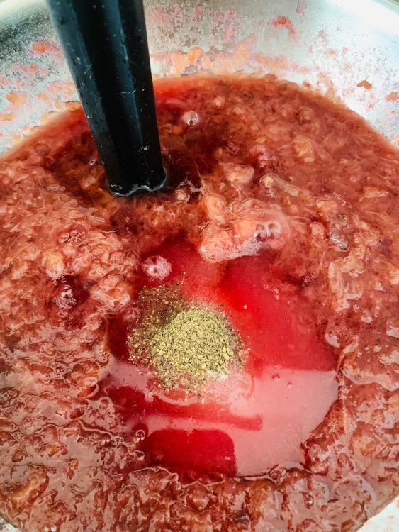 Step 2.2: Return the mashed plums to the stove