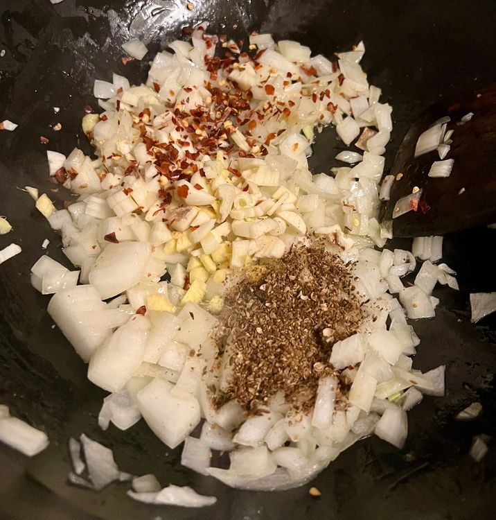 Step 1.1: Add your onions, garlic, and ginger and stir for three minutes, or until the onions become slightly translucent