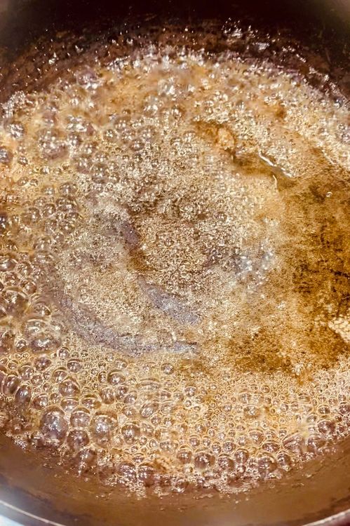 Step 1.1: Heat 3 tbsp sugar over medium heat in the same pot