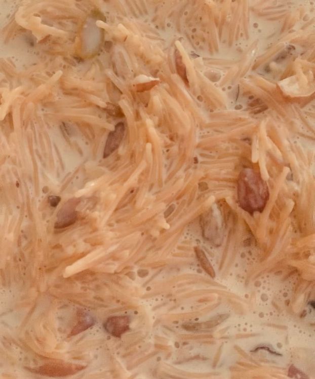 Step 1.5: Check the consistency of the Sheer Khurma and adjust as necessary by adding more milk or simmering longer to reduce the liquid to achieve the desired consistency