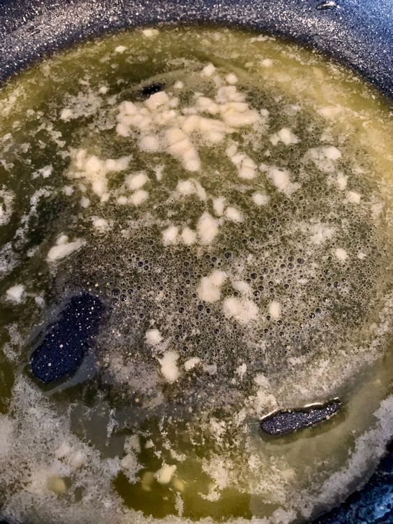 Step 2.1: In a wide pan, melt the butter over low heat