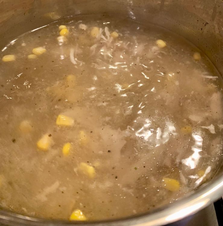Step 1.1: Reduce the flame to medium and slowly add the cornflour mix while stirring continuously