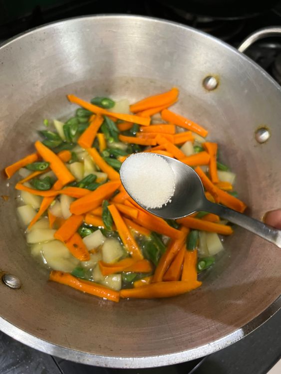 Step 1.3: In a pot, add the mixed vegetables, turmeric powder, salt, and water to just cover the vegetables and boil