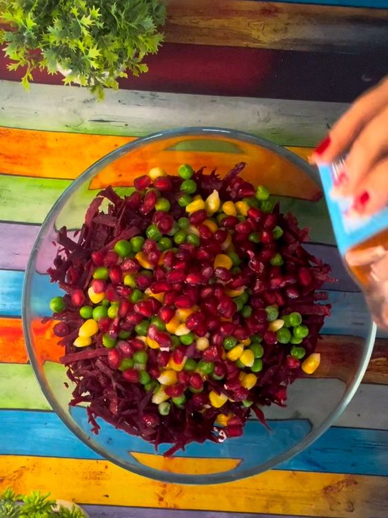 Step 1.1: In a bowl, mix grated paneer, beetroot, peas, corn, and pomegranate seeds along with taco seasoning