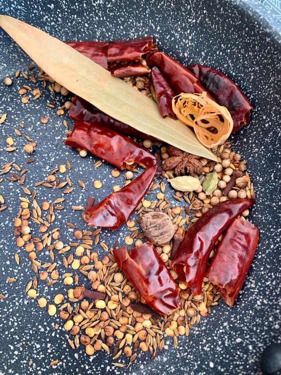 Step 1.1: Dry roast all the whole spices, except for the Kashmiri chilli powder, in a pan over low-medium heat until fragrant