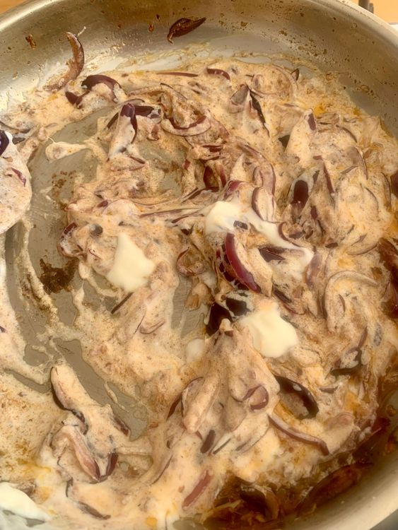 Step 4.1: Stir in the whisked yogurt and cook for 1-2 minutes