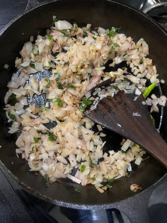 Step 2.1: Add the onions, ginger, and tomatoes
