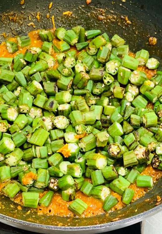 Step 1.1: Add the okra, stir and mix to combine