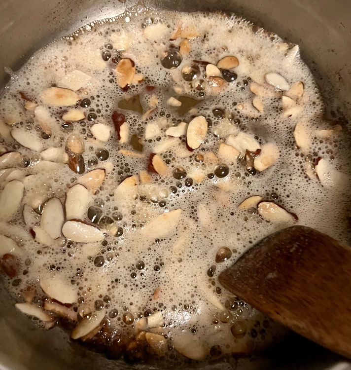 Step 2.2: Add the almond slices and cook until slightly browned, about 2-3 minutes, being careful not to burn them
