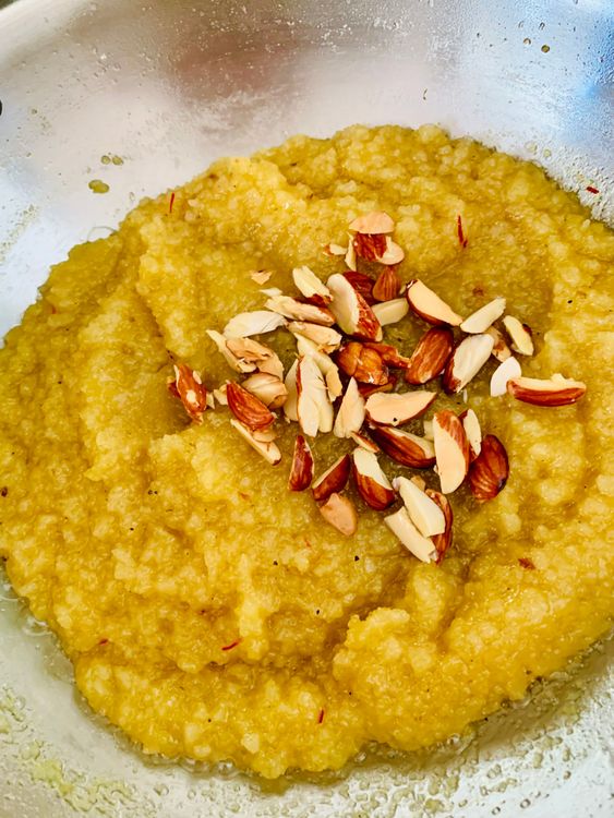 Step 4.1: Stir in the fried almonds and other dry fruits if using, mix well, and turn off the heat