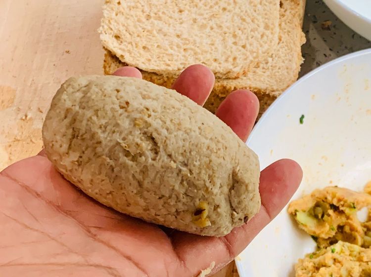 Step 1.2: Close the edges of the bread nicely by gently pressing the sides and giving it a round or an oval shape of your choice