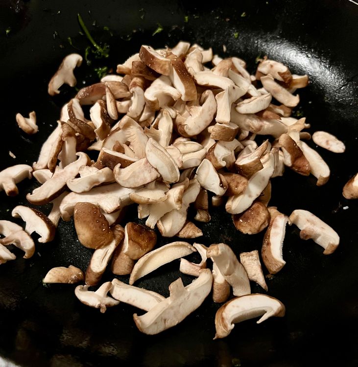 Step 1.1: Add your shiitake mushrooms to the now empty pan
