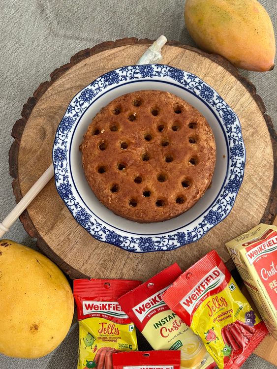 Step 1.1: Place the cake in the serving dish and poke holes evenly with the back of a wooden spoon or drinking straw