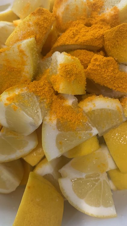 Step 1.2: Cut the lemons into small pieces and put them in a large mixing bowl