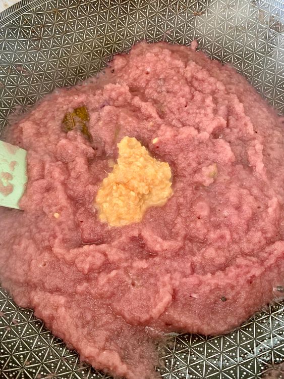 Step 2.1: Add ginger-garlic paste and cook until the raw smell disappears