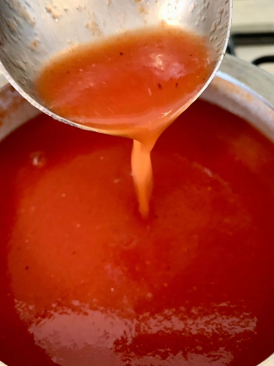 Step 1.1: In a bowl, make a slurry by mixing water and cornflour