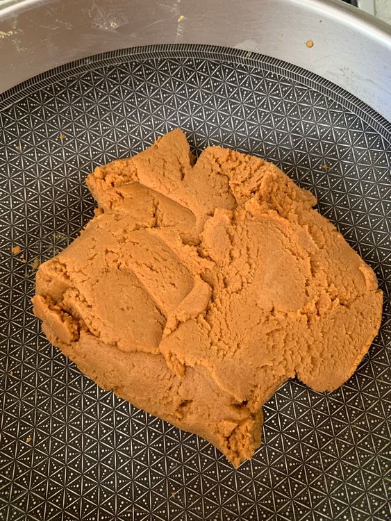 Step 3.1: Cook the mixture until it thickens and comes together like a soft dough
