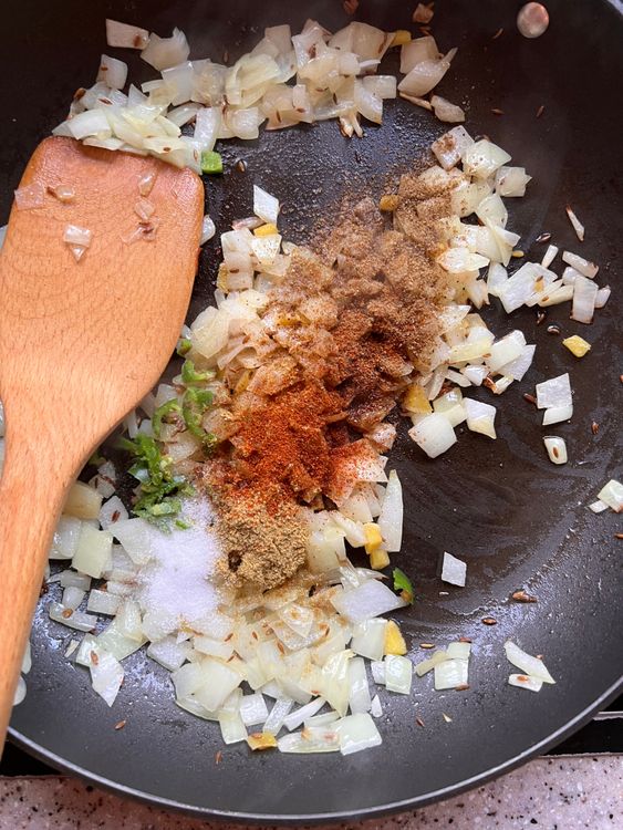 Step 2.1: Add the onions, ginger, and chili and cook until the onion has softened, about 3 - 5 minutes