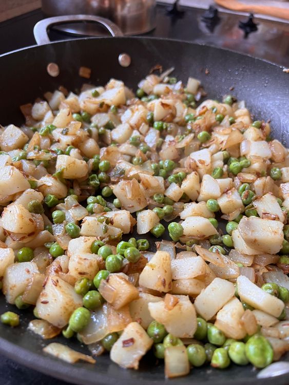 Step 2.1: Add the potatoes and stir into the mixture