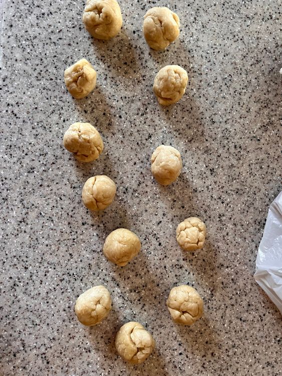 Step 3.1: Take your dough and divide it into 12 equally-sized balls