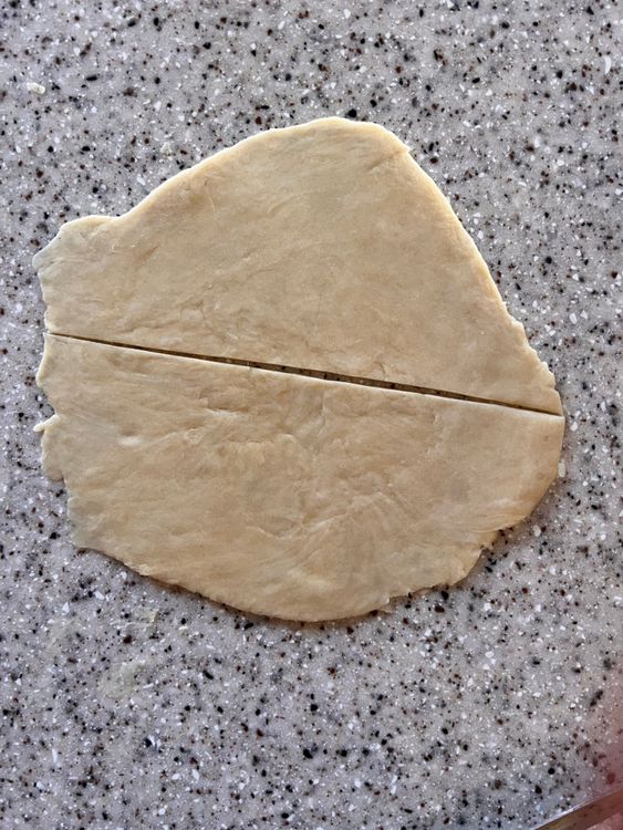Step 3.1: Take one ball and roll the dough into a 6-inch circular shape