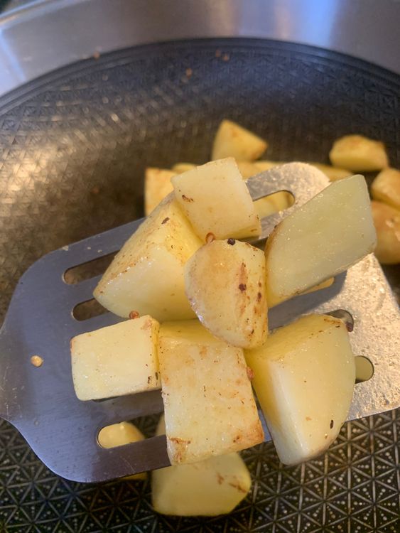 Step 1.1: Stir-fry cubed potatoes 90% cooked, set aside