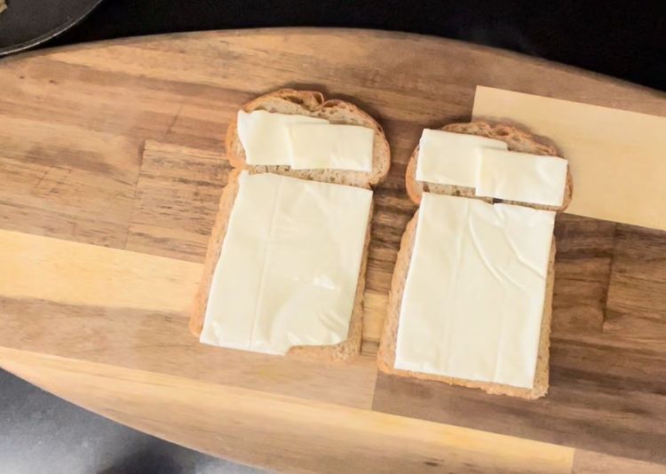 Step 1.1: Take two bread slices and apply cheese slice on both