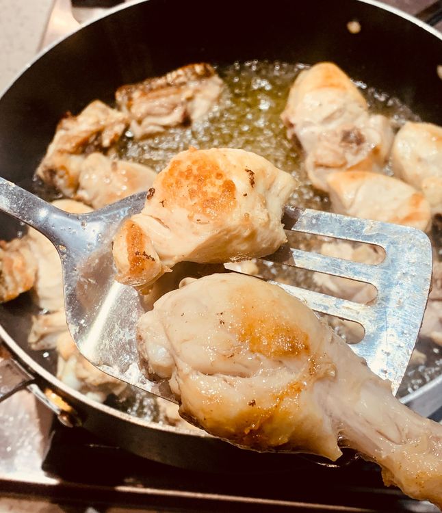 Step 1.2: Add ½ tsp salt in the hot oil and then add chicken pieces