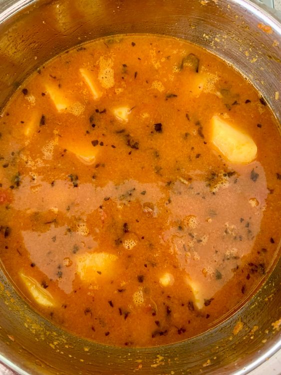 Step 4.1: Pour in hot water, stir everything together, and close the lid