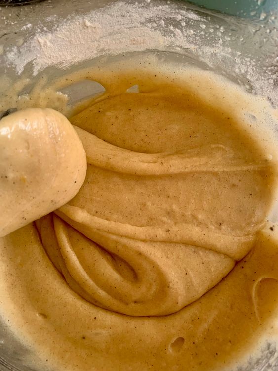 Step 1.2: Gradually add the flour mixture to the eggs, stirring gently to maintain a smooth and lump-free batter