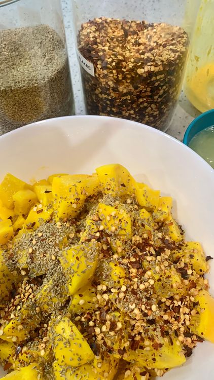 Step 1.1: After 2-3 days, add the carom seeds and red chilli flakes to the lemon pieces