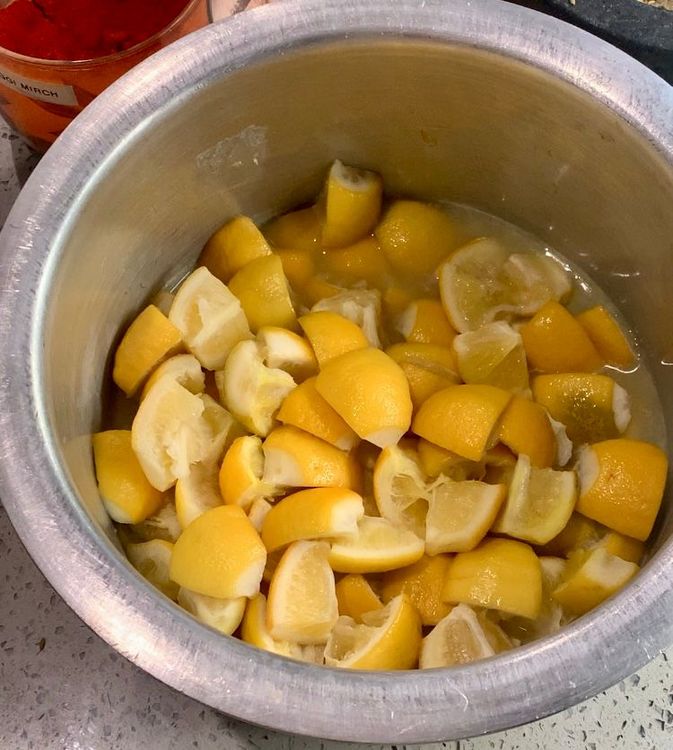Step 1.1: Remove the bowl from the pot and let the lemons cool down and become slightly warm