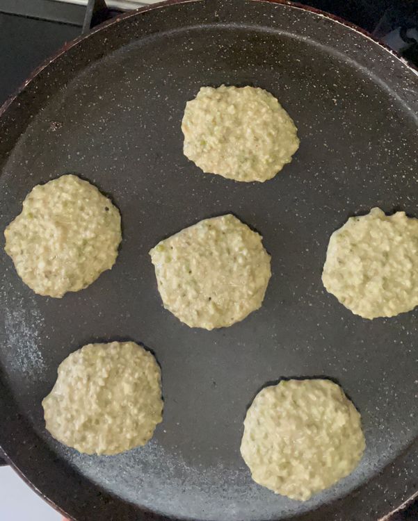 Step 1.1: Spread in bites on hot tawa as per your desired shape