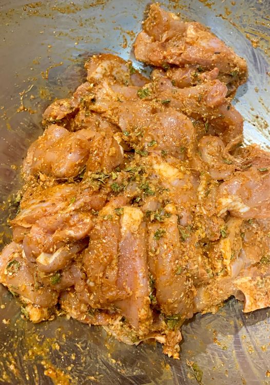 Step 1.1: In a large mixing bowl, combine the chicken pieces, salt, coriander powder, cumin powder, kashmiri red chilli powder, chaat masala, ginger garlic paste, lemon juice, kasuri methi, mustard oil, and curd
