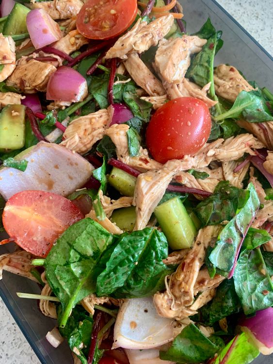 Step 1.1: Pour the prepared dressing over the salad and toss gently to ensure everything is coated evenly