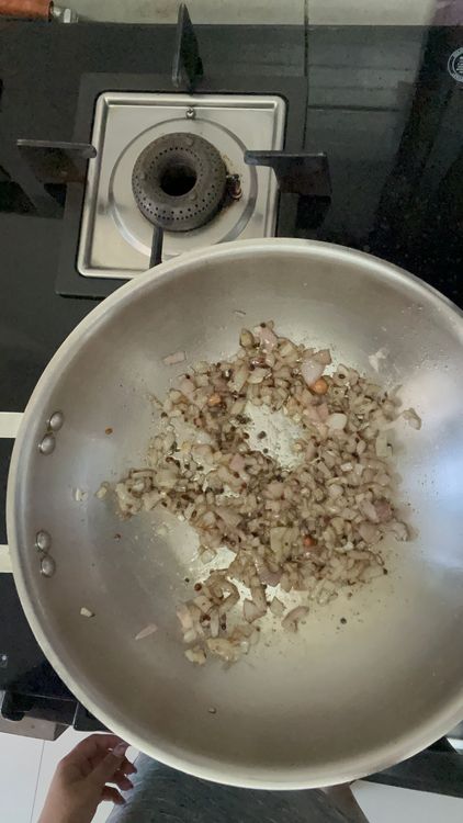 Step 1.2: In the same oil add onion , salt and pepper
