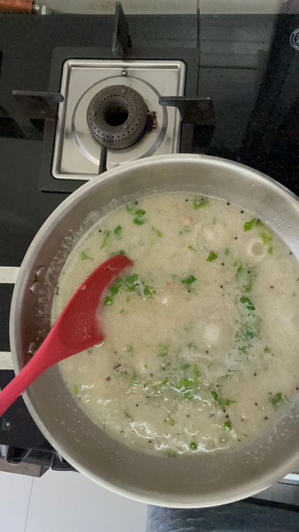 Step 1.1: Once it’s boiled add roasted rawa and little coriander leaves in water
