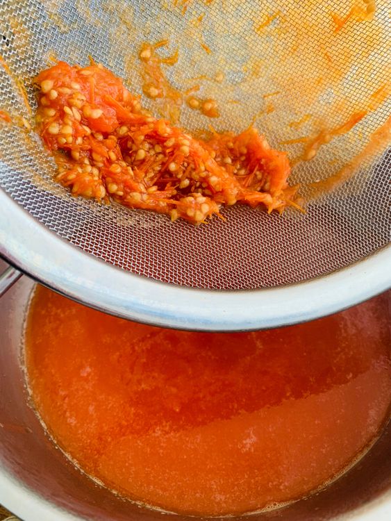 Step 2.2: Once cooled slightly, blend the tomatoes into a smooth puree