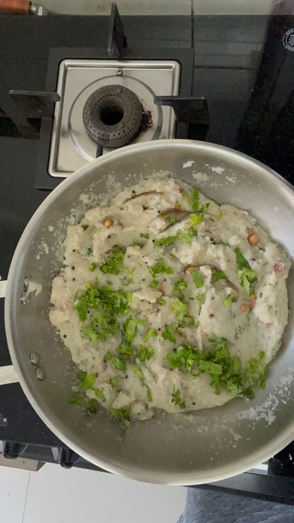 Step 1.1: Once the water is dried add peanuts and remaining coriander leaves
