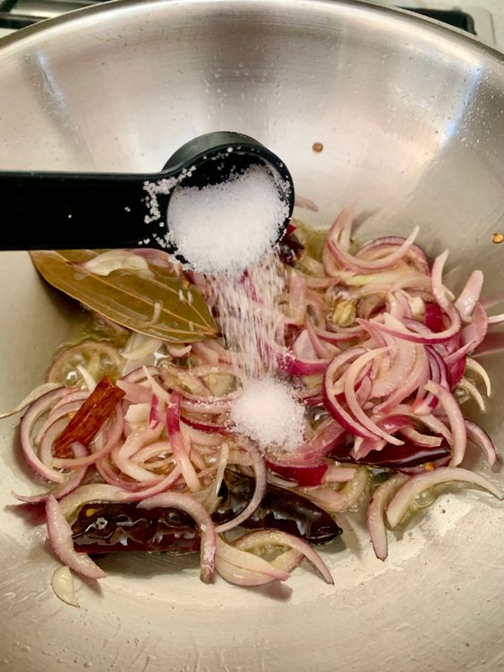 Step 4.1: Sprinkle in the sugar and continue to cook until the onions soften and turn golden brown