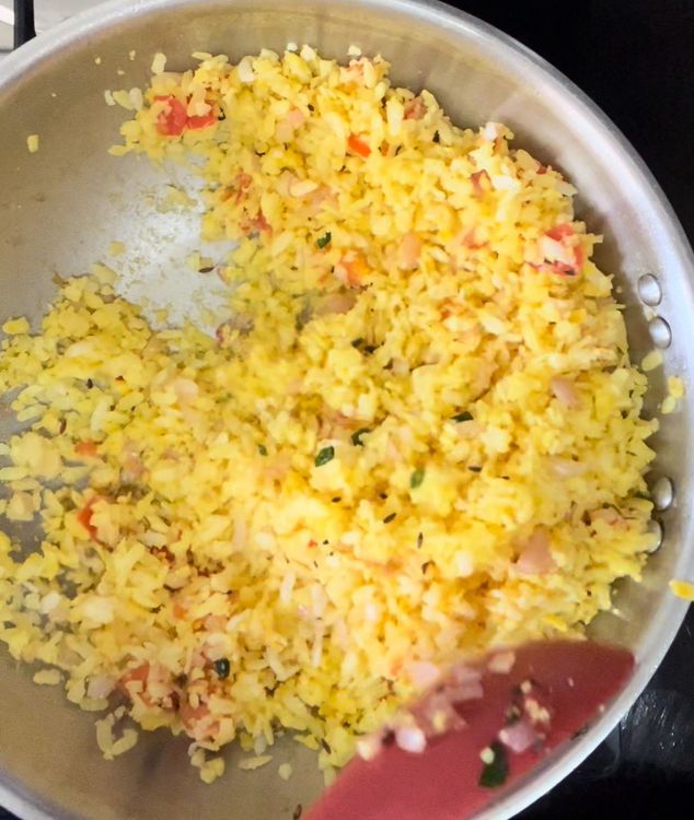 Step 1.2: Add poha into the pan and mix gently

