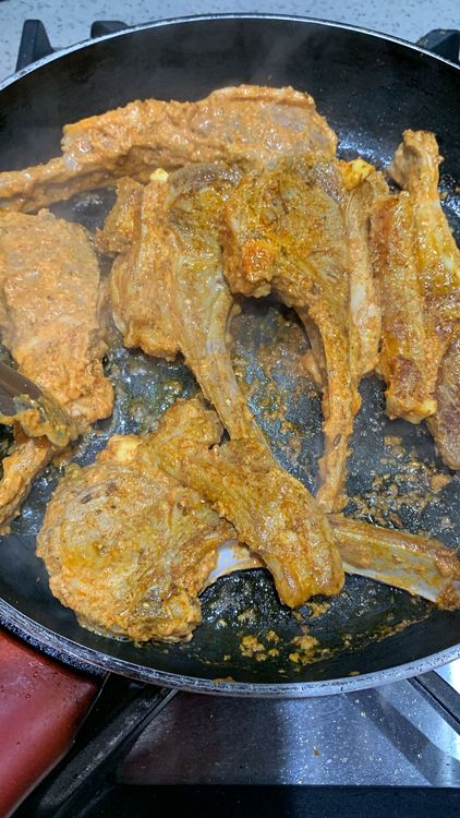 Step 1.2: Place the lamb chops in the pan and sear them for 3-4 minutes each side