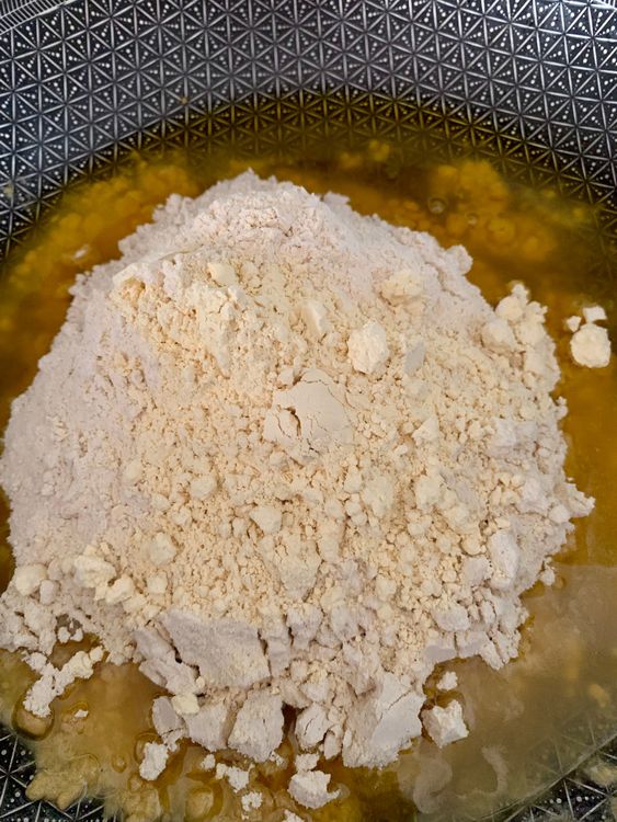Step 4.1: Add the atta and besan, and roast slowly, stirring constantly, until golden brown and aromatic