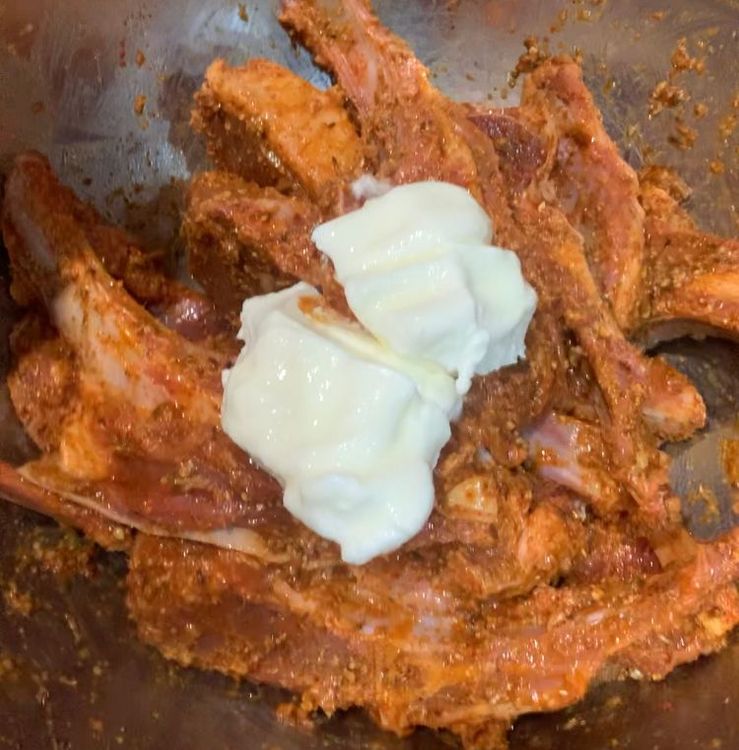Step 1.2: In a large mixing bowl, combine the lamb chops, lemon juice, ginger garlic paste, coriander powder, cumin powder, garam masala, kashmiri red chilli powder, salt, curd, and 2 tbsp oil