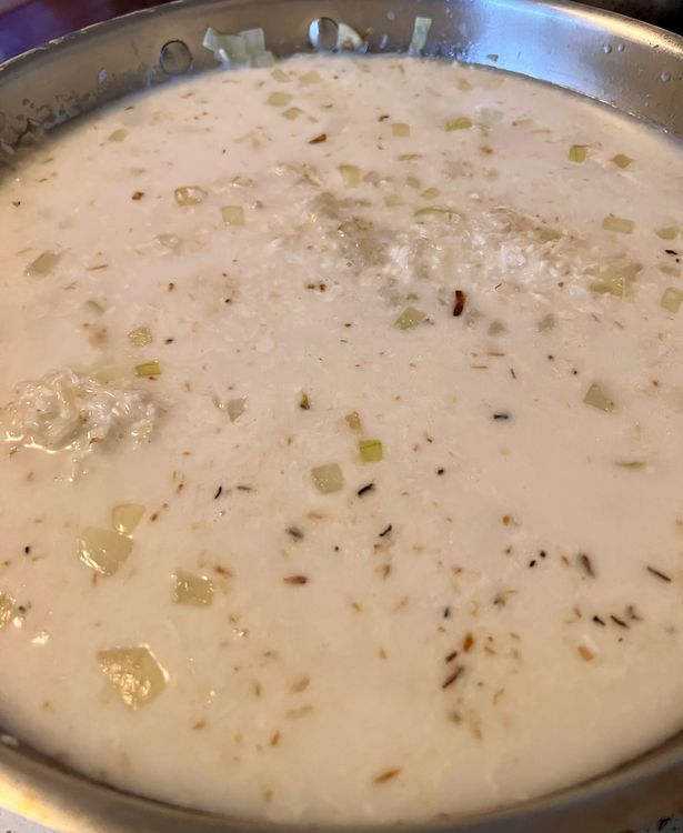 Step 1.1: Add the coconut milk and 2 cups of water, making sure all the rice is evenly covered