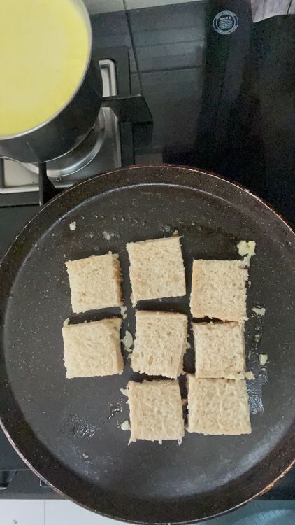 Step 1.1: Spread the butter mix on tawa and put the cubes
