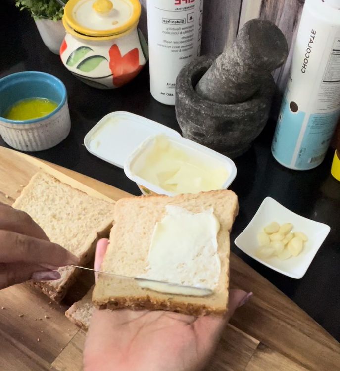 Step 1.1: Take bread slices and apply cheese spread
