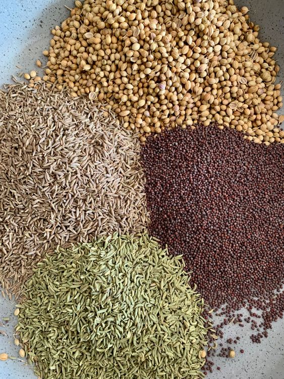 Step 1.1: In a heavy-bottomed pan, dry roast cumin, mustard, fennel, and coriander seeds over low heat until fragrant