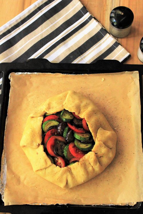 Step 3.1: Fold the edges of the dough over the filling, pleating gently